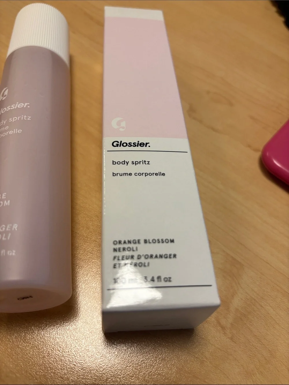 Glossier Light Pink Body Spray orange blossom neroli sprayed a few times